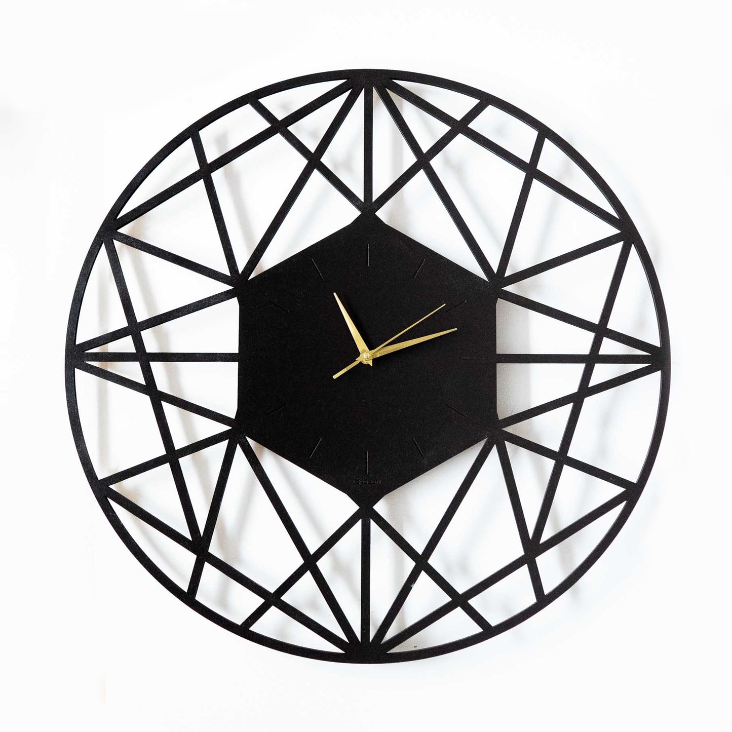 klok-geometrisch-design-modern-zwart-goud